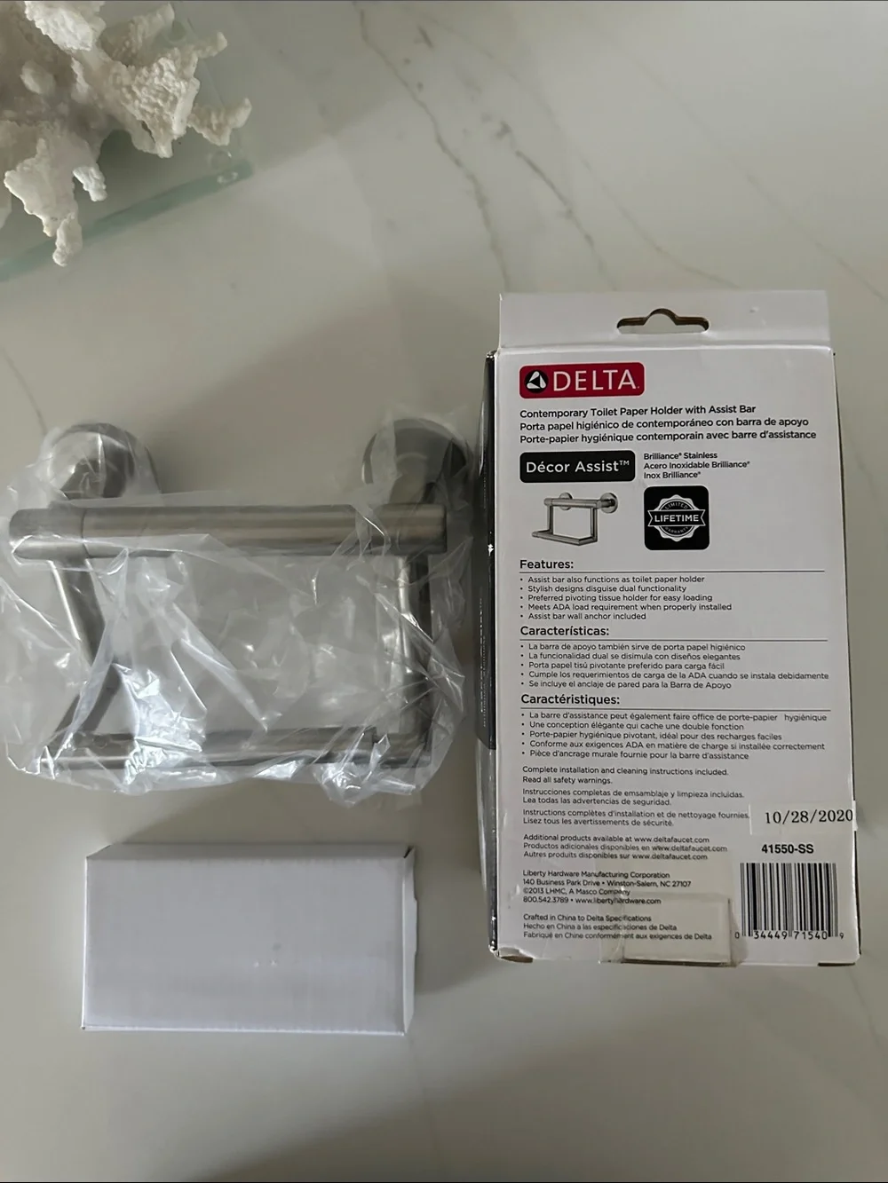 Delta Brushed Stainless Steel Toilet Paper Holder with Assist Bar. New in box.